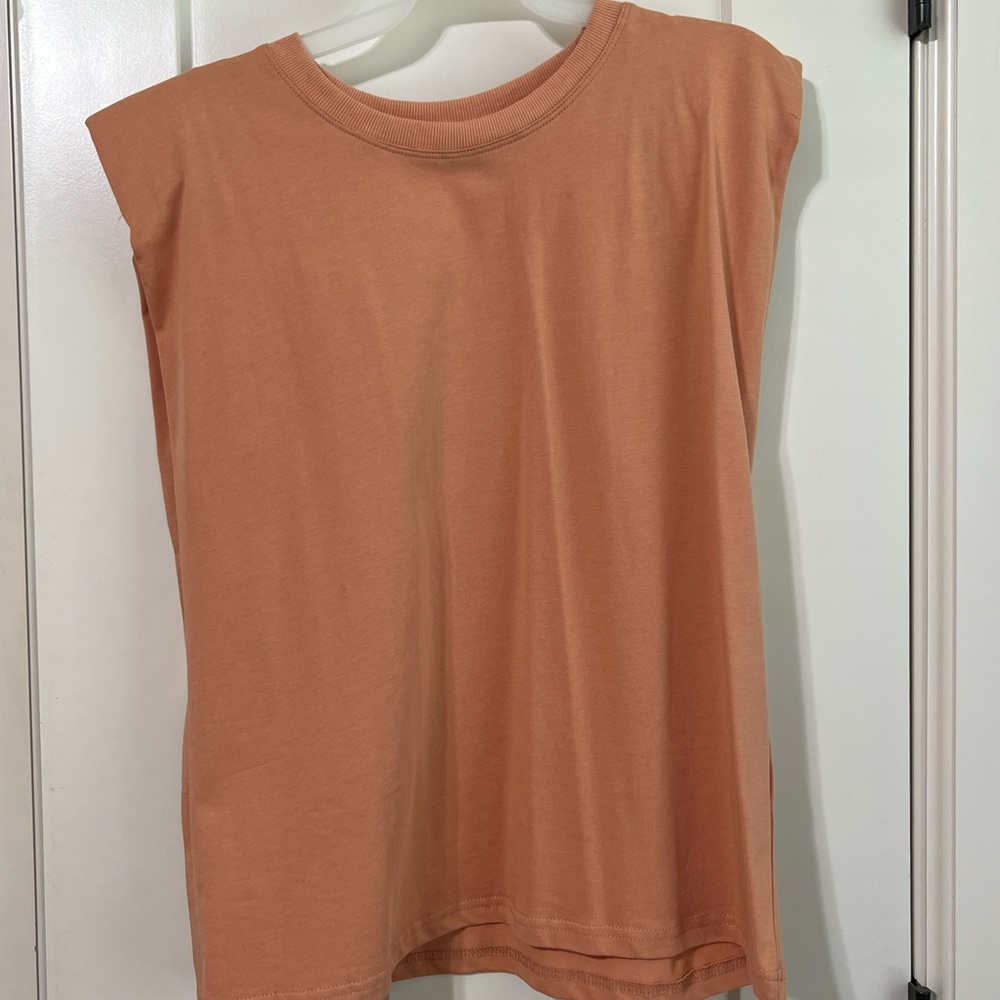 Orange shoulder pad top